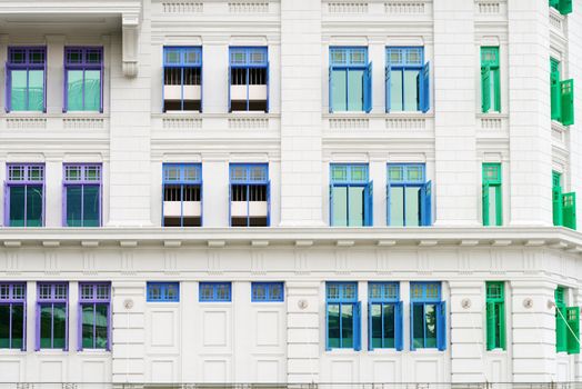 Retro windows with shutters in colonial architecture style building, Singapore
