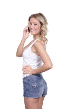 Young beautiful woman talking on cell phone