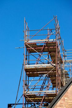 Scaffolding at the reconstruction o a roof