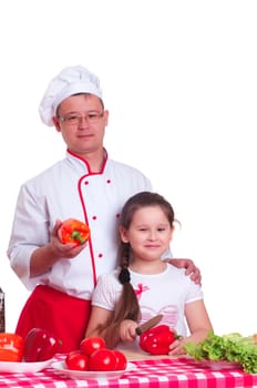 Father and daughter cooking a meal together