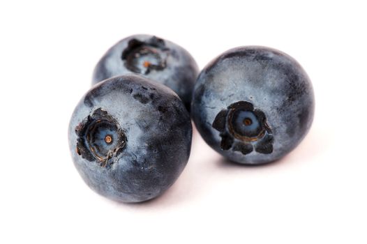 Closeup of blueberries isolated on white background
