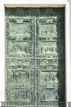 Image of the entrance door of the cathedral in Pisa, Tuscany, Italia