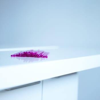 pink straws on a white table