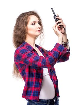 Attractive young woman in a checkered shirt with walkie talkie, isolated