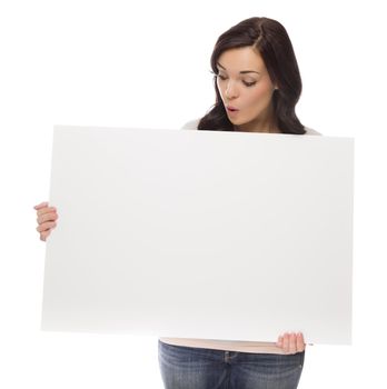 Beautiful Mixed Race Female Holding and Looking at Blank Sign Isolated on a White Background. 
