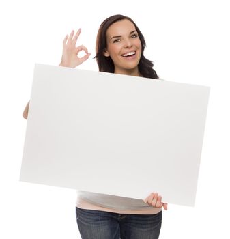 Beautiful Mixed Race Female Holding Blank Sign Isolated on a White Background Giving OK Gesture.
