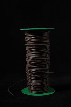 Roll of Twine isolated on a Black Background