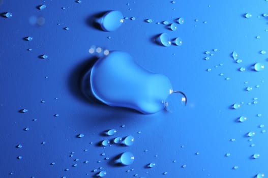 Some Water Drops on a Blue Textured Background
