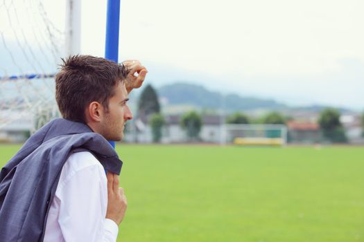 Soccer Coach thinking about the next match
