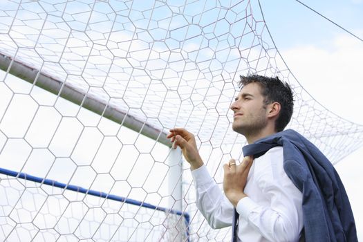 Soccer Coach thinking about the next match