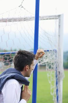 Soccer Coach looking the match