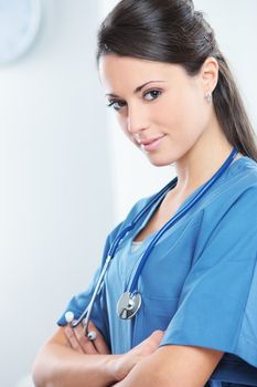 Portrait of a woman doctor with her arms crossed