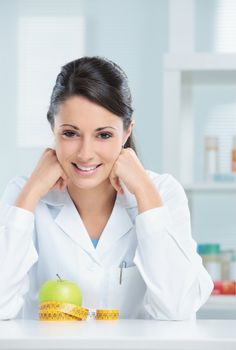 Portrait of a nutritionist female Doctor in her office