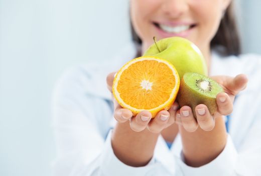 Doctor Nutritionist with Fruit in her hands