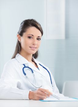 Portrait of a confident woman doctor sitting in her office