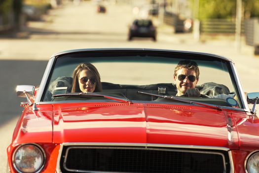 Beautiful couple during road trip on a sunny day