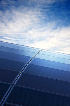 Green energy. Solar Panels in clear blue sky