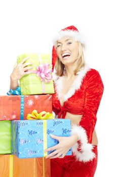 Smiling lady in Santa Claus costume with Christmas gift boxes