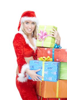 Smiling lady in Santa Claus costume with Christmas gift boxes