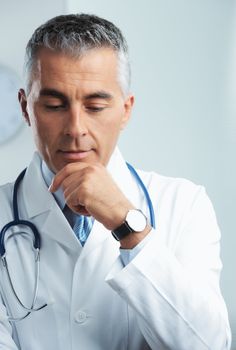  Portrait of a male handsome doctor thinking