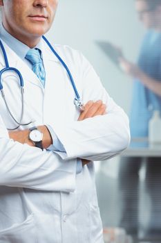 Close up shot of a male doctor, nurse on background