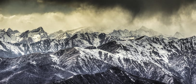 Monte Rosa group and storm clouds in autumn seasons, Italy