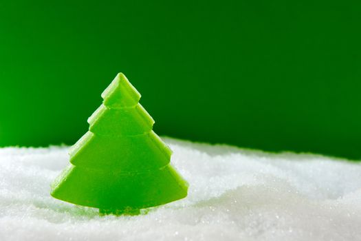 a christmas tree (made of soap) in the snow