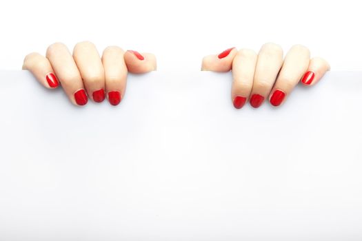 Fingers and blank billboard on a white background