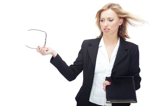 Angry businesswoman with hairs blown by wind