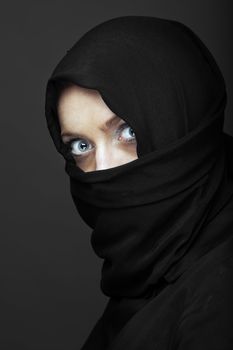 Face covered by hijab with angry expression 