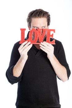 Romantic people in love shot in studio isolated on a white background