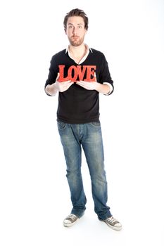 Romantic people in love shot in studio isolated on a white background