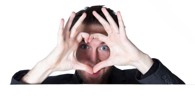 Attractive 30 years old caucasion man shot in studio isolated on a white background