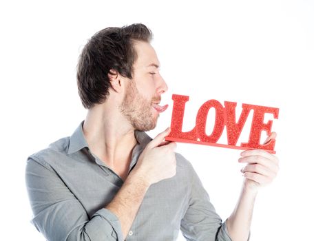 Romantic people in love shot in studio isolated on a white background