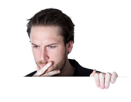 Attractive 30 years old caucasion man shot in studio isolated on a white background