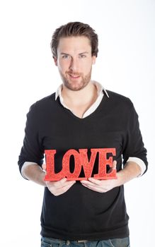 Romantic people in love shot in studio isolated on a white background