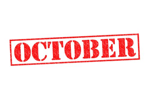 OCTOBER Rubber Stamp over a white background.