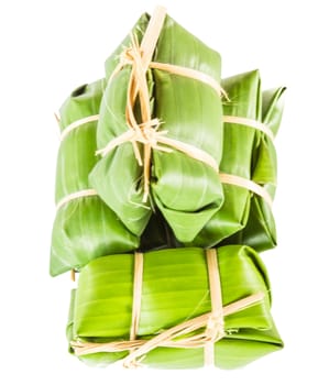 Khao tom mad is a Thai traditional dessert made from sticky rice, coconut milk, sugar , and bananas wrap with banana leaf.