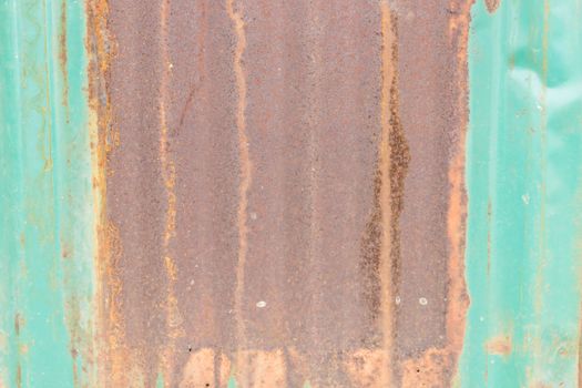 Full frame close-up of the rusty Damaged Corrugated Metal Rusted Surface Background