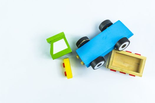 Crushed toy truck on a white background