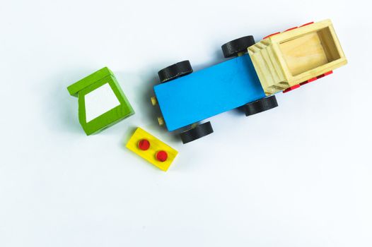 Crushed toy truck on a white background