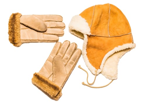 Gloves and winter cap on white background