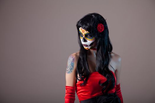 Girl with classic sugar skull makeup, Day of the Dead, Halloween 
