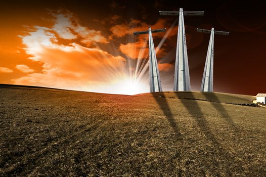 Hill with three crosses at sunset symbol of Christ's Calvary