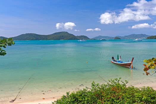 Boats near  shore waiting for tourists, Thailand. Beautiful tropical landscape.