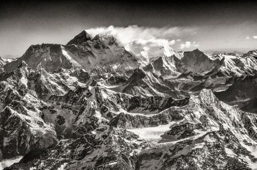 Vintage monochrome view of Mt Everest during mountain flight, Himalayas, Nepal