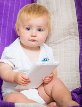 adorable baby with tablet PC