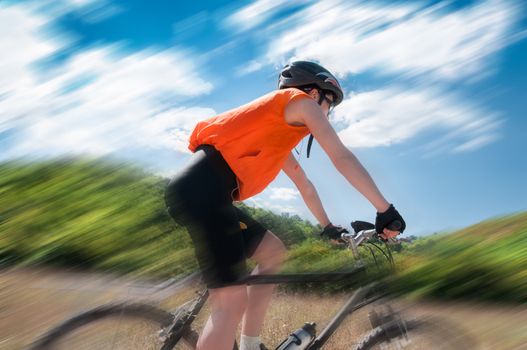 Mountain Biker and blue sky background with blur background