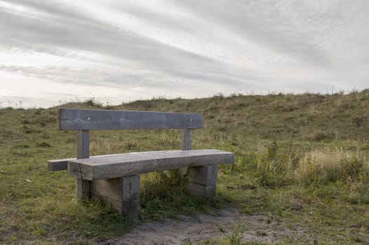 old ancient bench in the forest to sit and rest