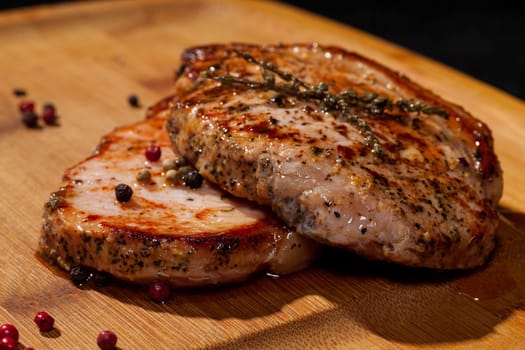 Grilled steak on wooden cutting board